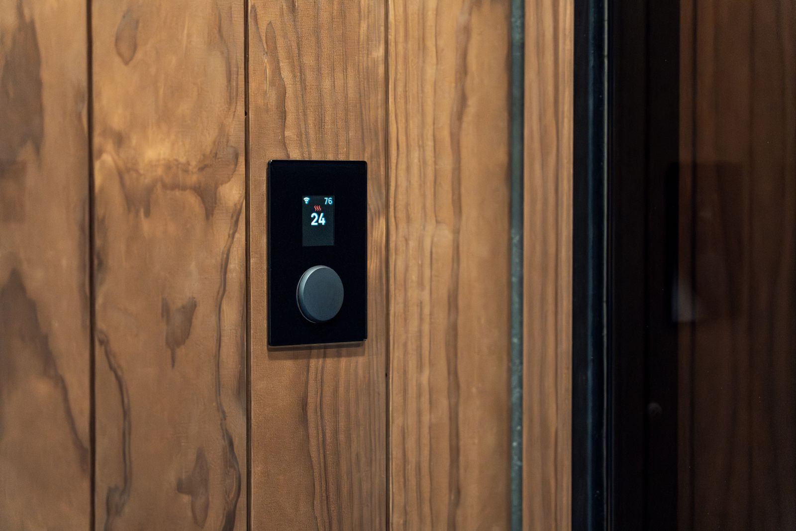 Smart home temperature control mounted on a wall