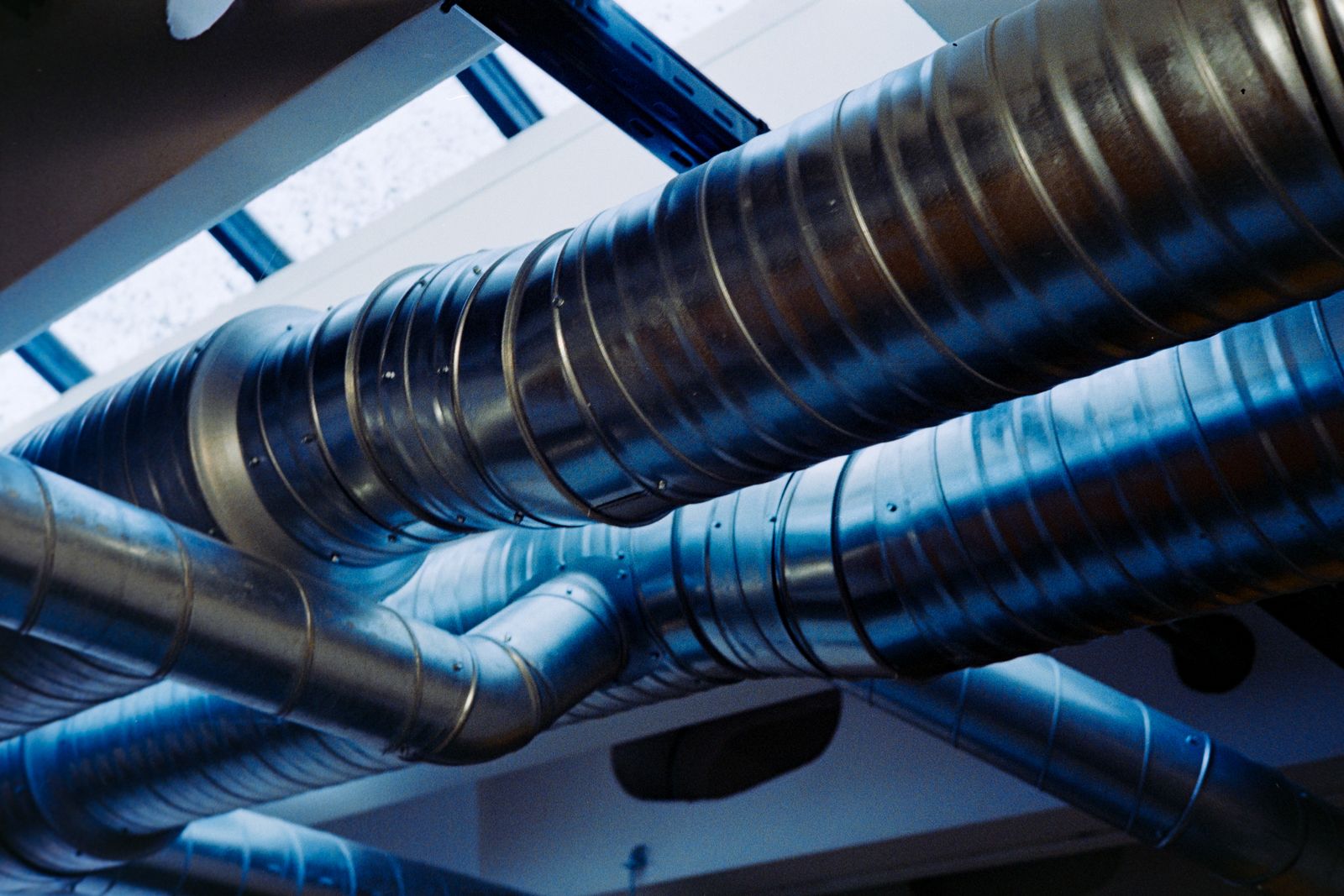 Ventilation ductwork installed in a commercial ceiling